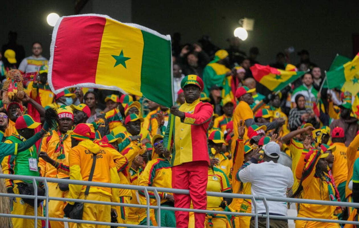 Supporters waving Senegalese flags