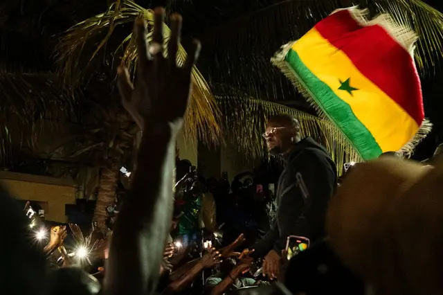 Ousmane Sonko greeted by supporters after his dismissal in Dakar, May 23, 2026