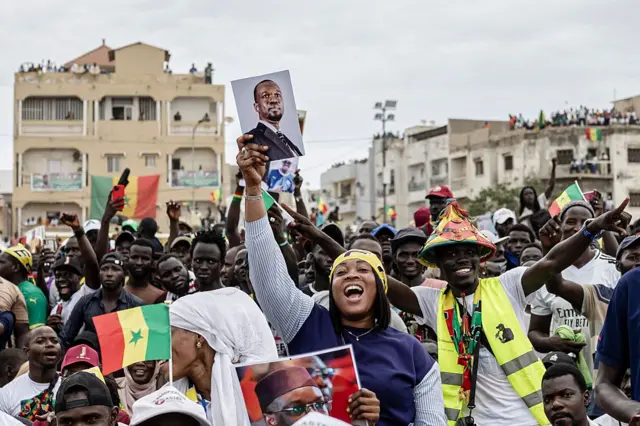Supporters of Ousmane Sonko celebrate during a rally in Dakar, November 8, 2025