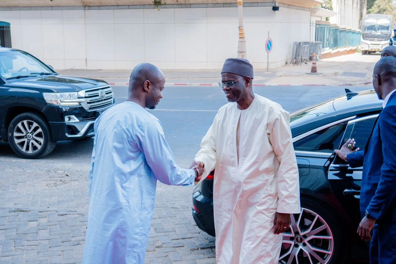 Outgoing and incoming Senegalese prime ministers during formal handover Outgoing and incoming Senegalese prime ministers during formal handover