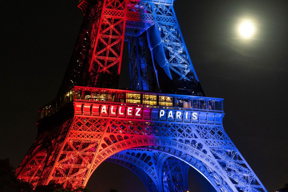 Eiffel Tower illuminated in team colors ahead of the Champions League final