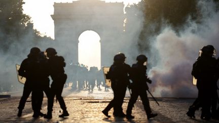 CRS police officers on the Champs-Élysées during the Champions League final celebrations in Paris on May 30, 2026