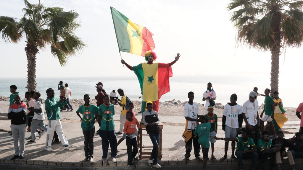 Senegal football fans celebrating during a parade in Dakar streets on January 20, 2026. (Illustrative image)
