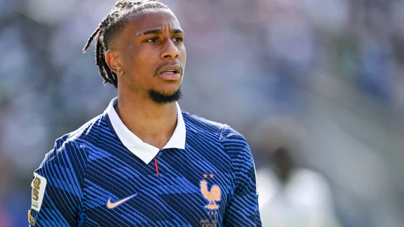 Michael Olise in action for France