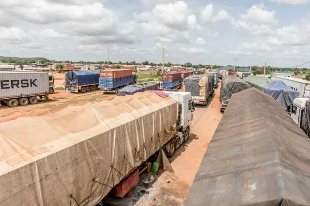 Long queues of trucks stranded at the closed Benin-Niger border crossing in Malanville