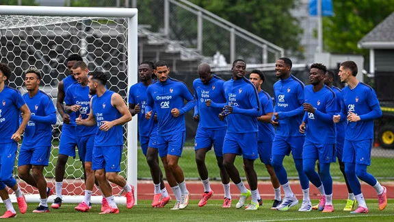 French national team players in a huddle