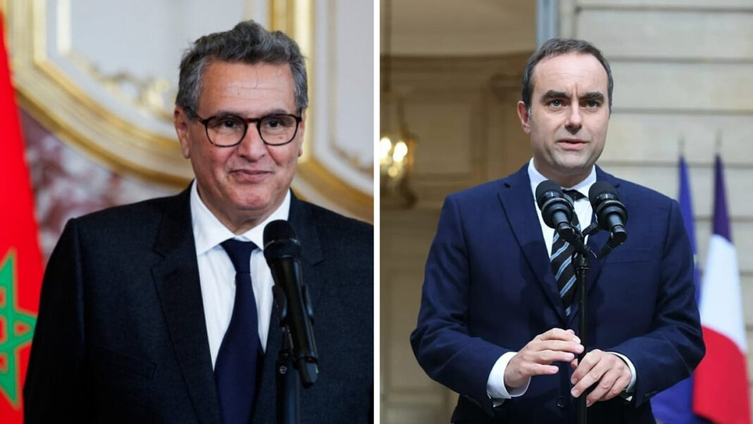 Moroccan and French officials at a diplomatic meeting