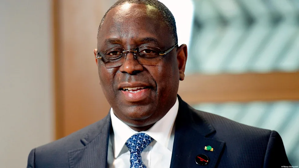 Senegal's President Bassirou Diomaye Faye and former President Macky Sall seated during a meeting