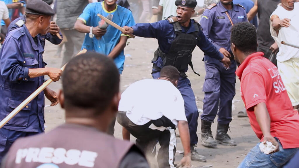 Clashes between police and demonstrators in Kinshasa during a protest against constitutional changes in June 2026 (illustrative image).
