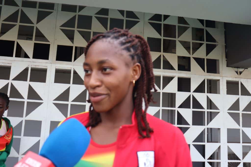 Zalissa Zongo celebrating her triple jump victory
