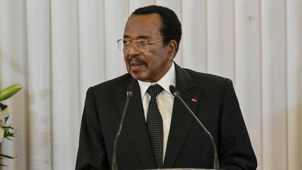 Cameroon's president Paul Biya addressing the public alongside Pope Leo XIV at the Yaoundé presidential palace during an 11-day apostolic visit to Africa on April 15, 2026.