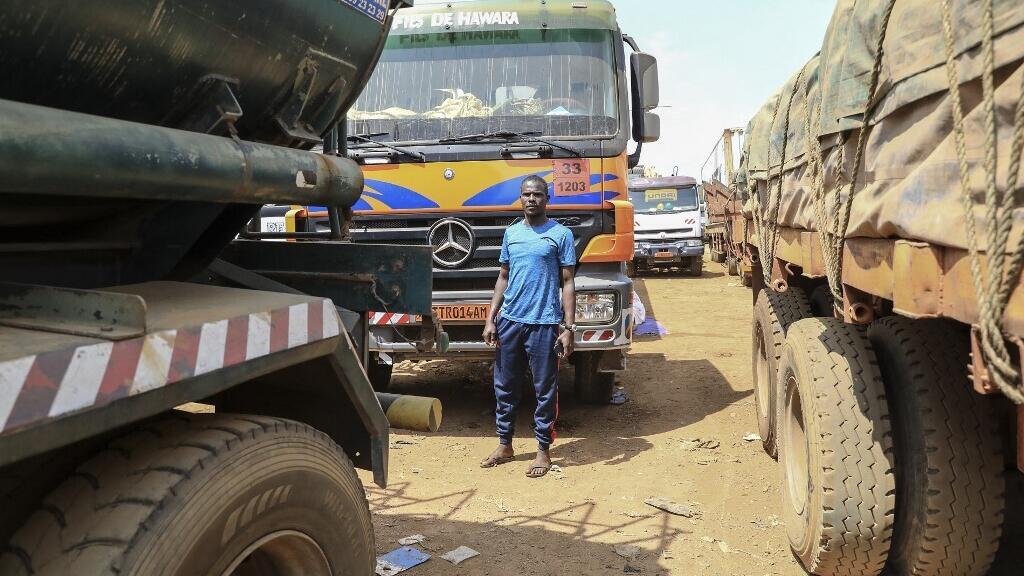 Trucks waiting on the main road connecting Bangui in the Central African Republic to Douala, Cameroon (illustration image).