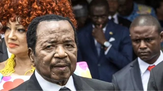 Paul Biya during a public appearance in Cameroun, welcoming Pope Léon XIV in April 2026, accompanied by officials and his wife, First Lady Chantal Biya.