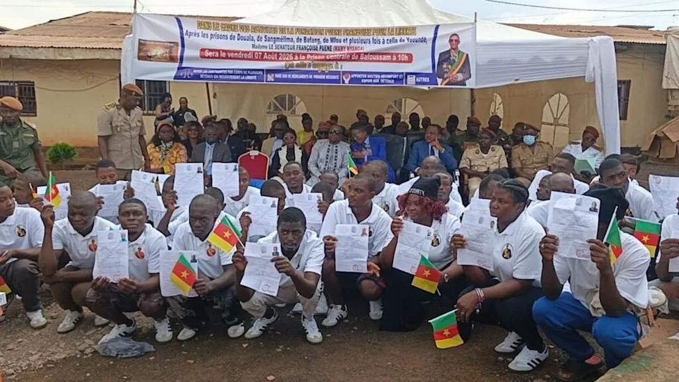 A group of young ex-prisoners celebrating their release in Cameroon