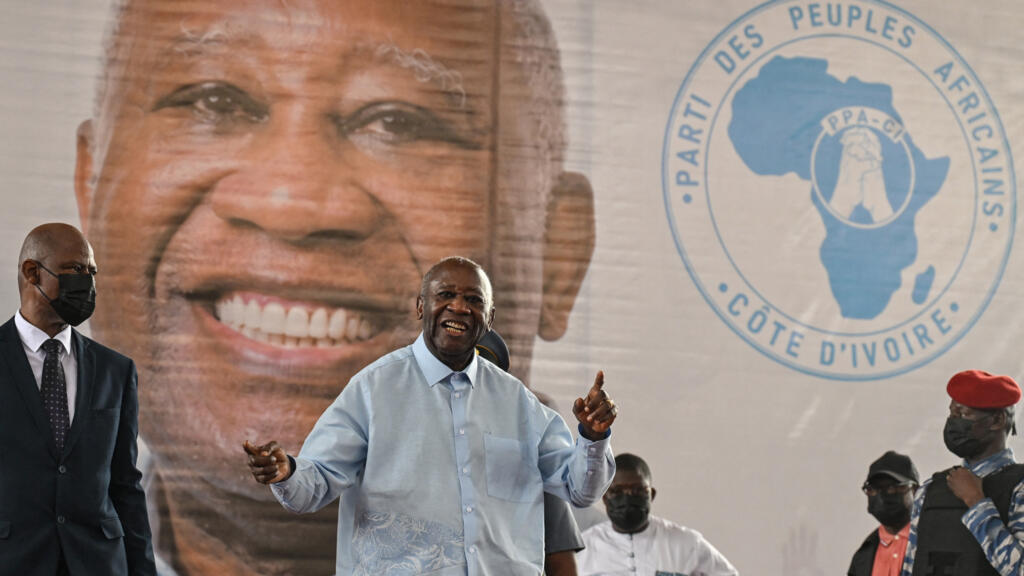 Former Ivorian President and President of the Popular African Party of Côte d'Ivoire (PPA-CI), Laurent Gbagbo (center), reacts during the closing ceremony of the first congress of his party in Abidjan on May 15, 2026.